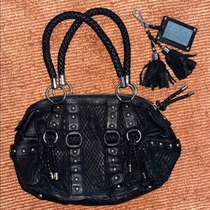 Vintage authentic Bebe leather purse with matching leather whip keychain